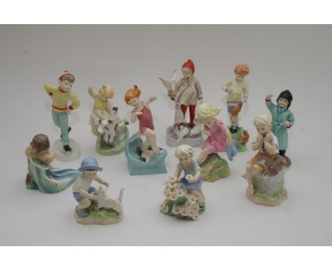 A Collection of 11 Royal Worcester figures