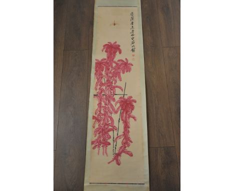 An early 20th Century Chinese watercolour scroll decorated with a dragonfly and foliage
