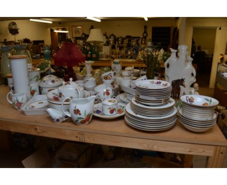 An extensive Royal Worcester Evsham pattern dinner and tea service complete with kitchen storage jars
