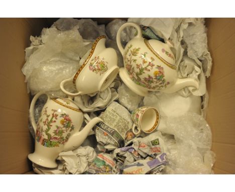 A box containing a Washington Indian tree pattern dinner and tea service 