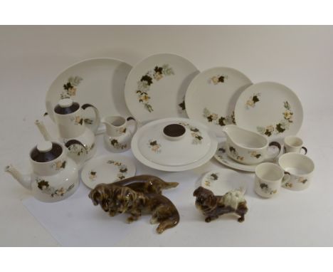 An extensive Westwood Royal Doulton dinner and tea service, and a group of continental porcelain dog ornaments 

