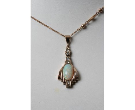  A quality Art Deco design opal and diamond pendent with a conforming chain 
