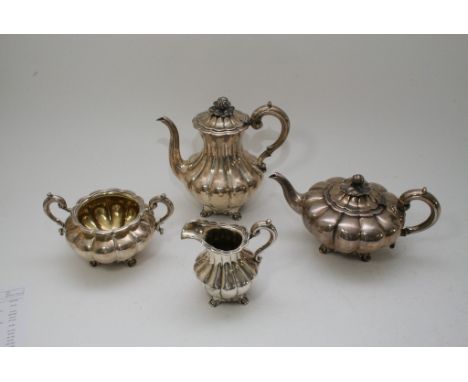 A silver four piece tea and coffee service of scalloped form, London 1841.