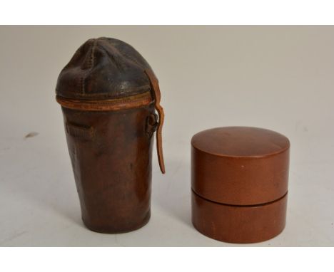 An antique travelling flask in leather carry case together with a set of three triangular perfume bottles in leather case. 