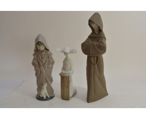 A Lladro figure of a monk, nun and a Nao figure (3) 