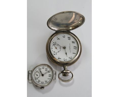A silver cased pocket watch and a silver wrist watch.