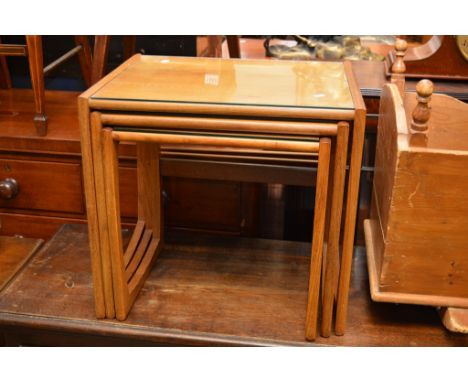 A nest of three modern design Ercol tables
