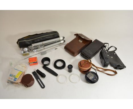 A collection of photographic equipment to include a Kodak No 1a folding camera, light meter etc