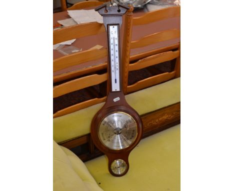 A reproduction mahogany barometer
