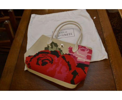 A large limited edition Lulu Guinness designer handbag, embroidered cream canvas 'Life is a bed of Roses', with dustbag
