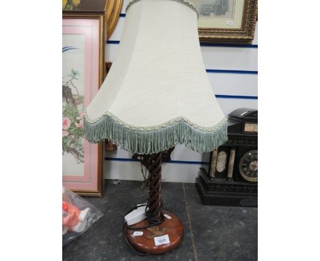 Woodend table lamp with spiral stem and bird motif, with shade. 