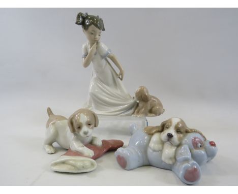 3 Nao figurines, girl with puppy and 2 puppies with toys.