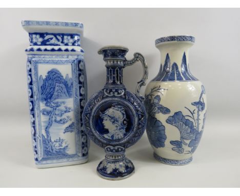 2 Blue and white oriental ceramic vases and a German salt glaze moon flask jug, the tallest is approx 13".