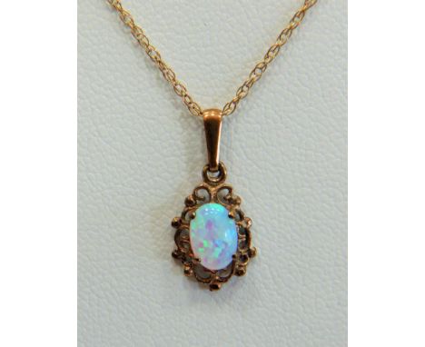 9ct Opal Set pendant set upon a 9ct gold 18 inch chain.   Total Weight 1.2g