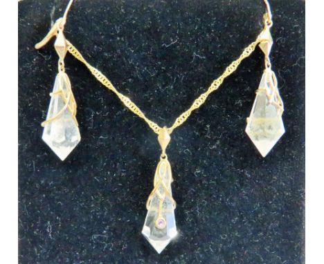 9ct Jewellery set by Uri Geller. Crystal gemstones set to pendant and earrings with 9ct yellow gold mounts and 20 inch 9ct Ch