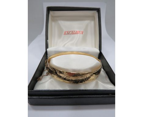 Excalibur 12ct Rolled Gold bangle with safety chain and original box. See photos. 