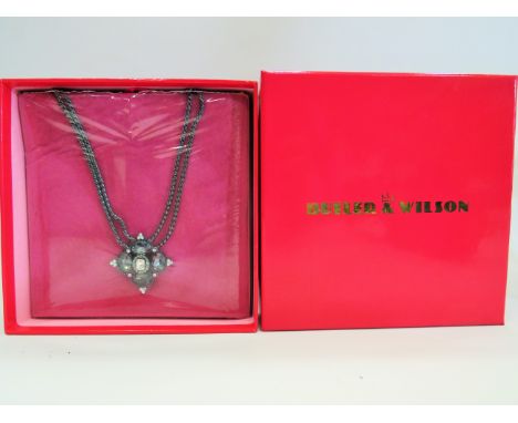 Unused and boxed. Buter &amp; Wilson pendant with a 16 inch chain. Still in cellowrap in original box. See photos. 