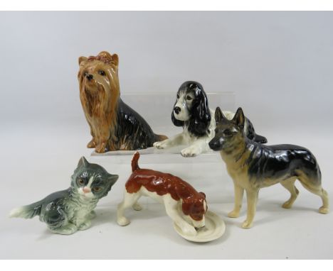 Beswick and Slyvac dog figurines and a Goebel cat figurine.