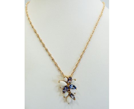 9ct Opal and Tanzanite set leaf pendant (25mm) set upon a 20 inch double link 9ct chain. Total weight 3.7g