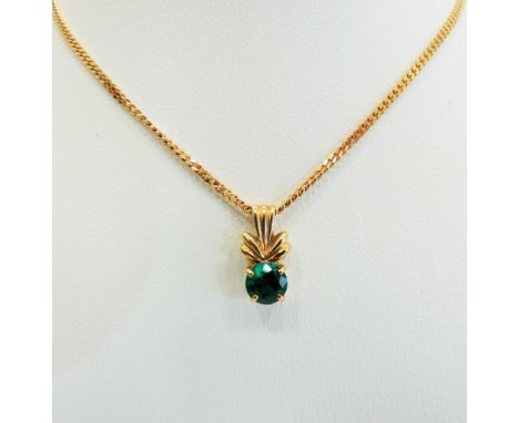 9ct Yellow Gold Emerald coloured Circular CZ set pendant hung upon an 18 inch chain.  Total Weight  5.1g