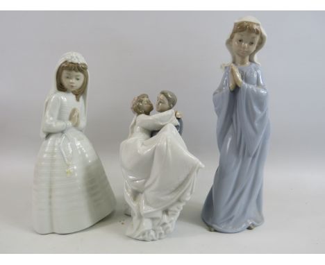 2 Nao figurines of girls praying plus a bride and groom. The tallest measures 11".