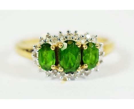 9ct Yellow Gold Ring set with Three Central Emeralds with Diamond Surround..   Finger size 'Q-5 to R'    2.0g
