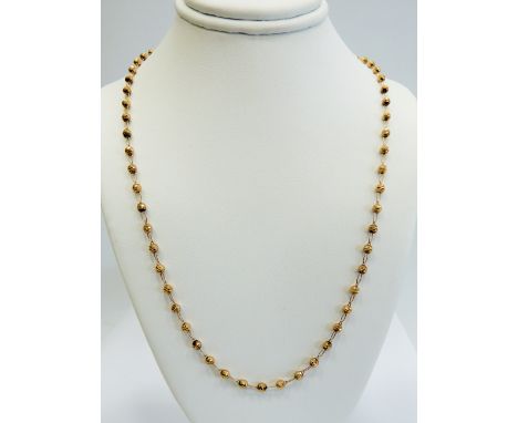 9ct Yellow Gold 20 inch Neck Chain interspersed with small globes between links.  Total weight approx 4.2g