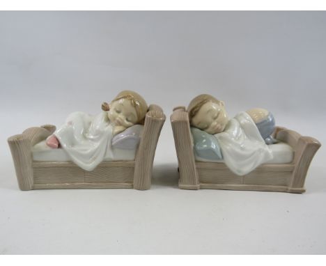 2 Nao figurines Snuggle dreams and cozy dreams.