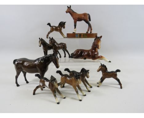 Small beswick Mare figurine 8 foals and a Sylvac foal.