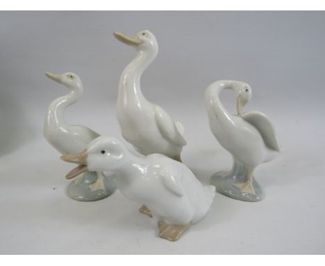 2 Nao and 2 Lladro duck figurines.