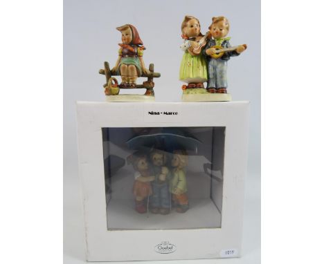 Boxed Nina Marco Goebel figurine called Summer rain plus 2 other Goebel figurines.