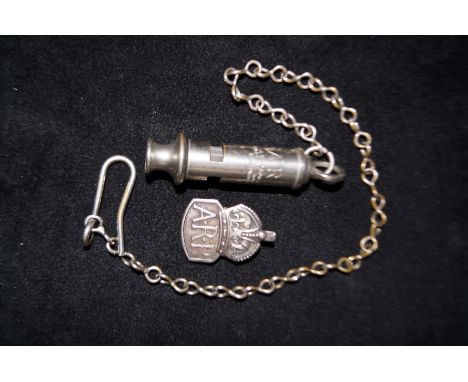Silver A.R.P badge, whistle &amp; chain