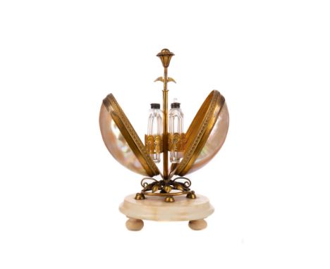 LATE 19TH CENTURY FRENCH PERFUME CADDY, formed as two brass mounted mother of pearl shells, with push button opening to revea