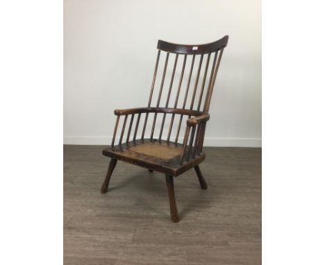 LATE GEORGE III OAK AND ELM COUNTRY MADE COMB BACK CHAIR, on splayed supports