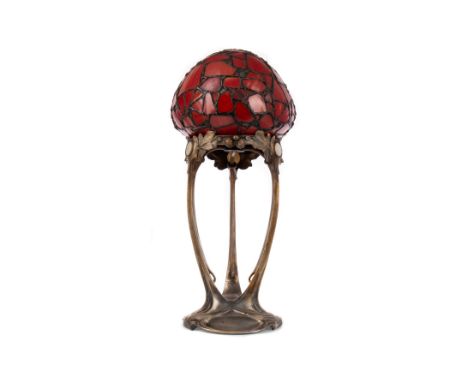 ART NOUVEAU TABLE LAMP, with mushroom form leaded shade, on flowing silvered base inset with mother of pearl roundels, appare