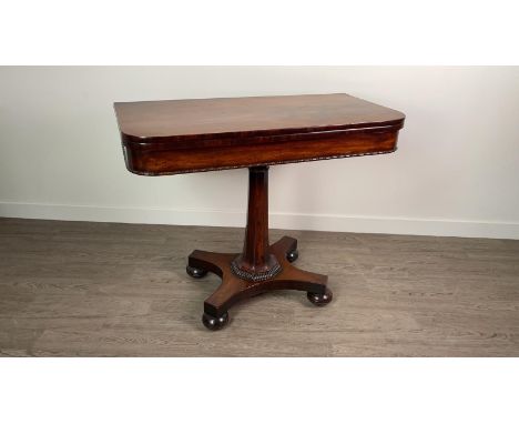 WILLIAM IV MAHOGANY FOLD OVER CARD TABLE, on tapered column to quadripartite base on bun feet, 92cm wide