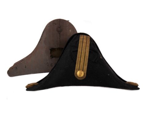 VICTORIAN NAVAL OFFICER'S BICORN HAT, by Galt of Portsmouth, the black felt hat outlined in silk and with ribbon cockade, mou