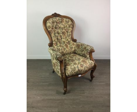 VICTORIAN NURSING CHAIR, of serpentine outline, button-back in floral upholstery, raised on knee-carved cabriole supports to 