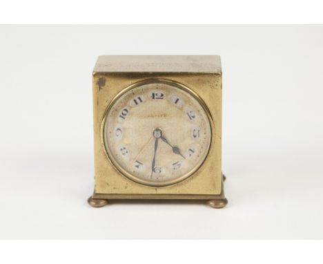 ZENITH WATCH Co, SWISS GILT METAL SMALL ALARM CLOCK, the 1 ½" Arabic dial with spring driven movement, housed in a polished, 