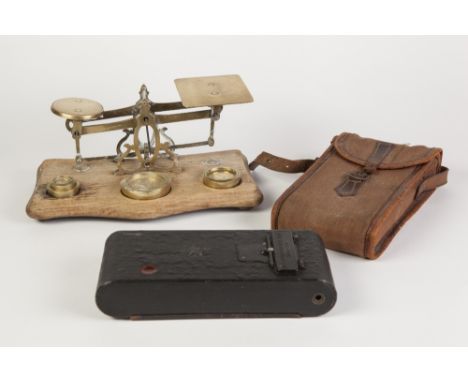 EARLY 19TH CENTURY BRASS POSTAL SCALES OF TRADITIONAL FORM  on mahogany serpentine front base to receiver the FOUR BRASS FLAN
