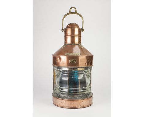 COPPER AND BRASS 'TRAWLING' SHIP'S LAMP, of typical form, the front applied with a plaque stamped: 634 over 250L, 24" (61cm) 