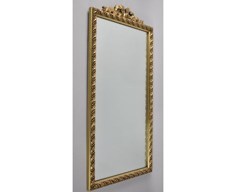 A Gilt Framed Wall Mirror with Bow Ribbon Finial, 70x35cm 