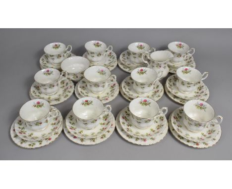 A Royal Albert Winsome Pattern Tea Set to Comprise Twelve Cups, Twelve Saucers, Twelve Side Plates, Milk Jug and Sugar Bowl 