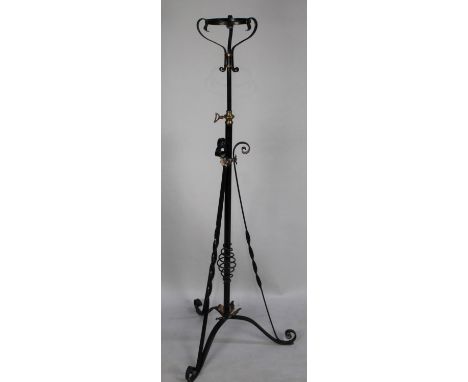 A Late Victorian Wrought Iron and Brass Adjustable Oil Lamp Stand on Tripod Scrolled Base 