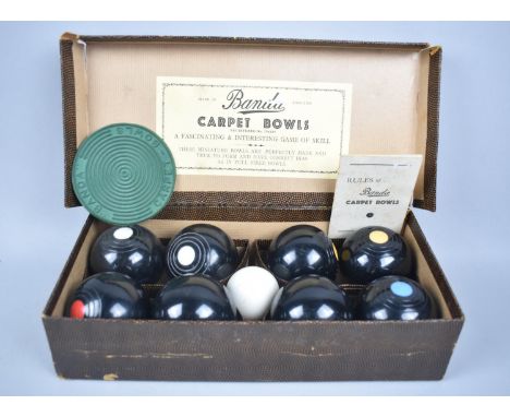 A Vintage Cased Set of Banda Carpet Bowls with Rules, Booklet and Mat 