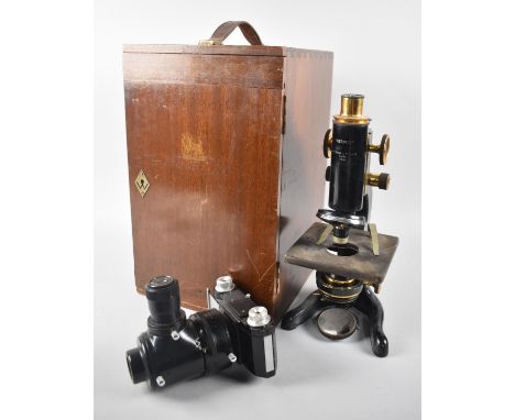 A Cased Edwardian Monocular Brass Mounted Microscope by Watson and Son, "The Service" together with a Microscope Camera 