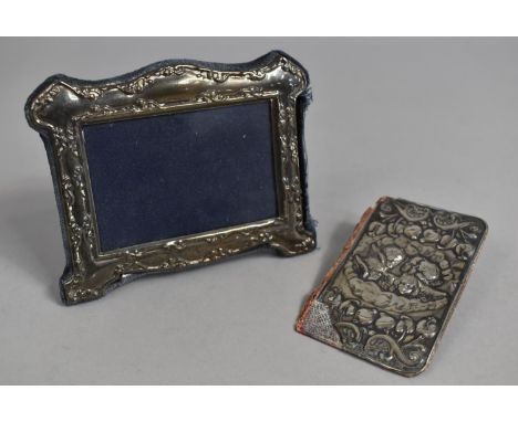 A Silver Framed Photo Frame Together with a Silver Book Cover, Condition issues 