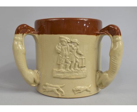 A Stoneware Glazed Tyg Decorated in Relief with Hunting, Tavern and Other Scenes, the Handles in the Form of Greyhounds, 13cm