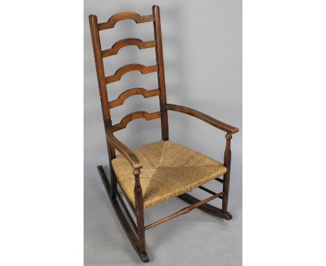 A Mid 20th Century Rush Seated Ladder Back Rocking Chair 
