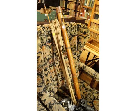 Of angling interest: a Hardy bamboo rod case, 92.5cm long; together with a split cane rod; and an old fishing reel. Condition